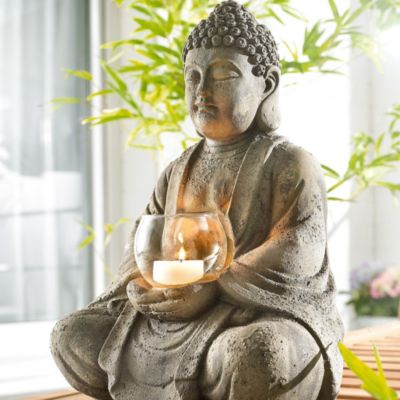 Buddha mit Windlicht